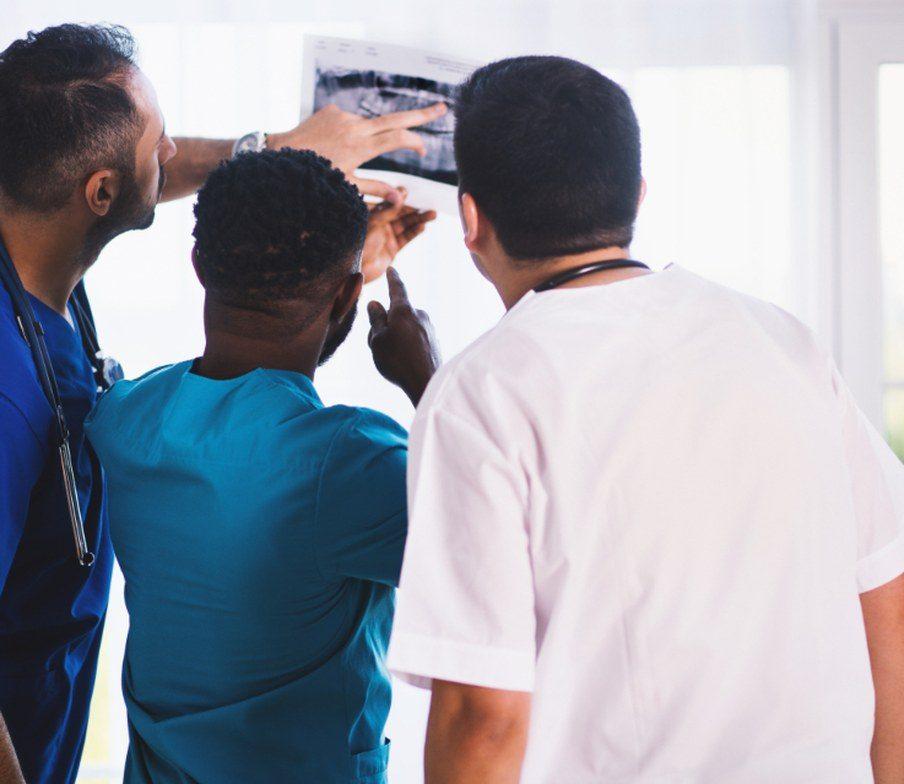 A Medice nurse educator going through glucose readings with a patient